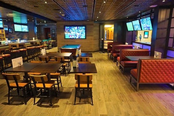 Inside Playmakers Sports Bar and Arcade on Mariner of the Seas