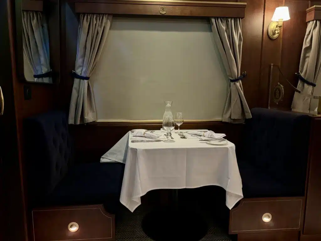 Inside the train car on the Royal Railway - Utopia Station